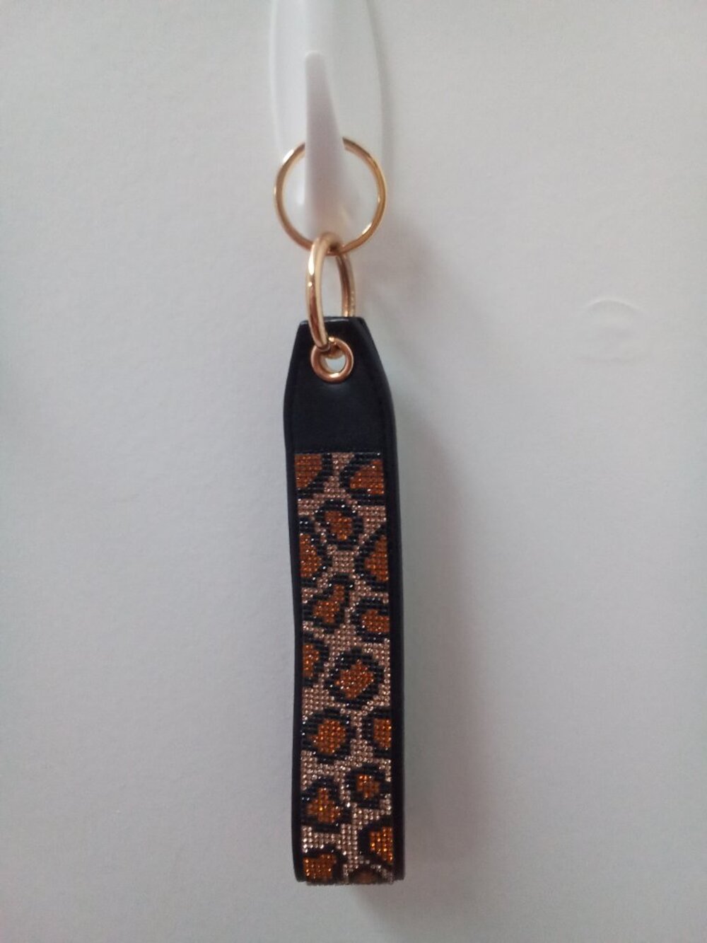 Original Victoria’s Secret charm missing.